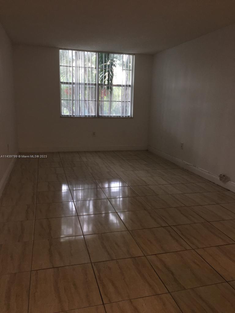 498 Northwest 165th Street, Unit D205 Miami, FL 33169 - Photo 16 of 18