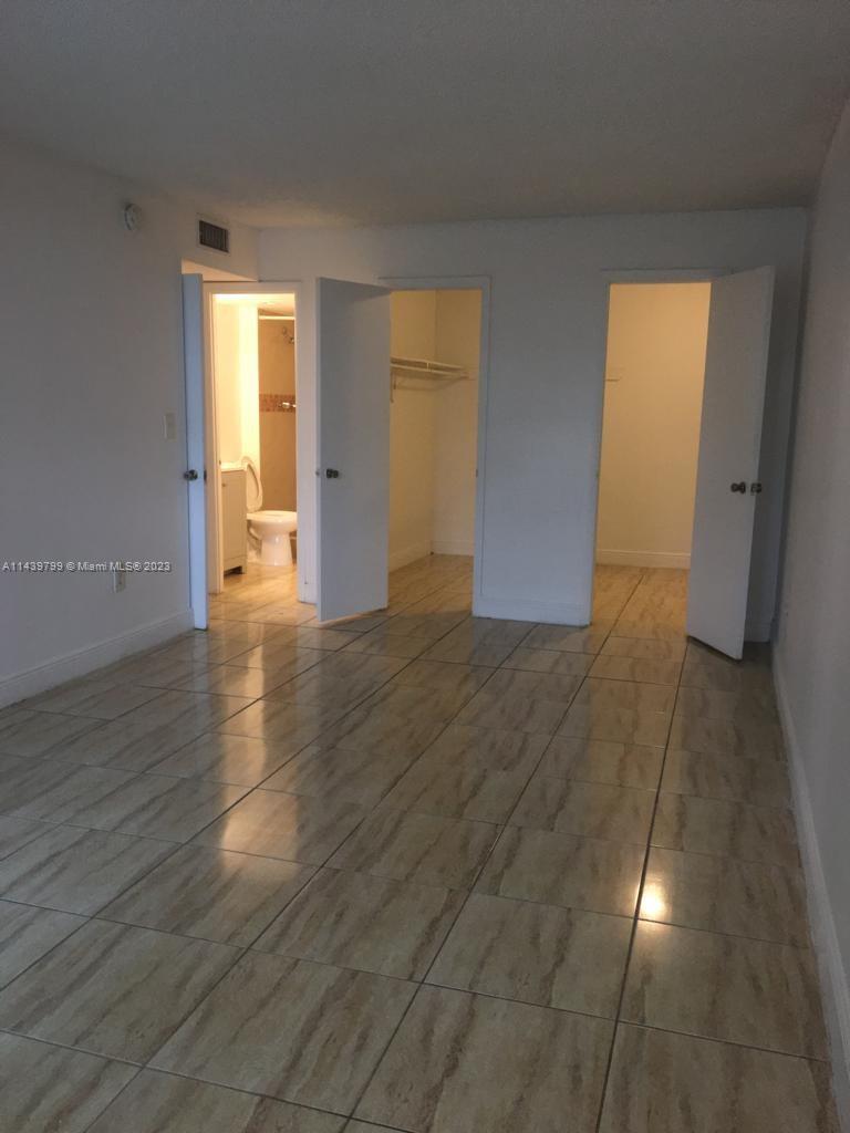 498 Northwest 165th Street, Unit D205 Miami, FL 33169 - Photo 17 of 18