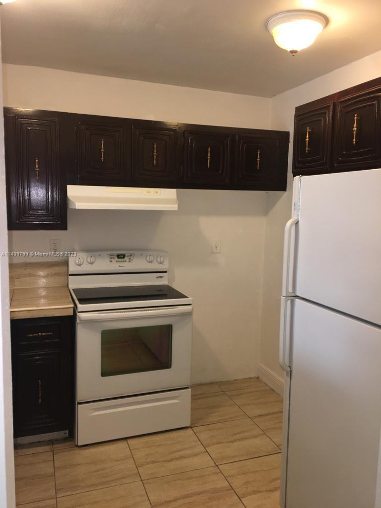 498 Northwest 165th Street, Unit D205 Miami, FL 33169 - Photo 3 of 18