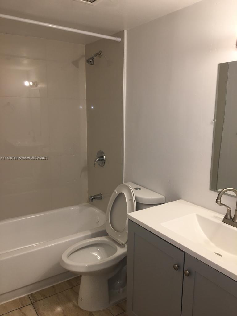 498 Northwest 165th Street, Unit D205 Miami, FL 33169 - Photo 5 of 18