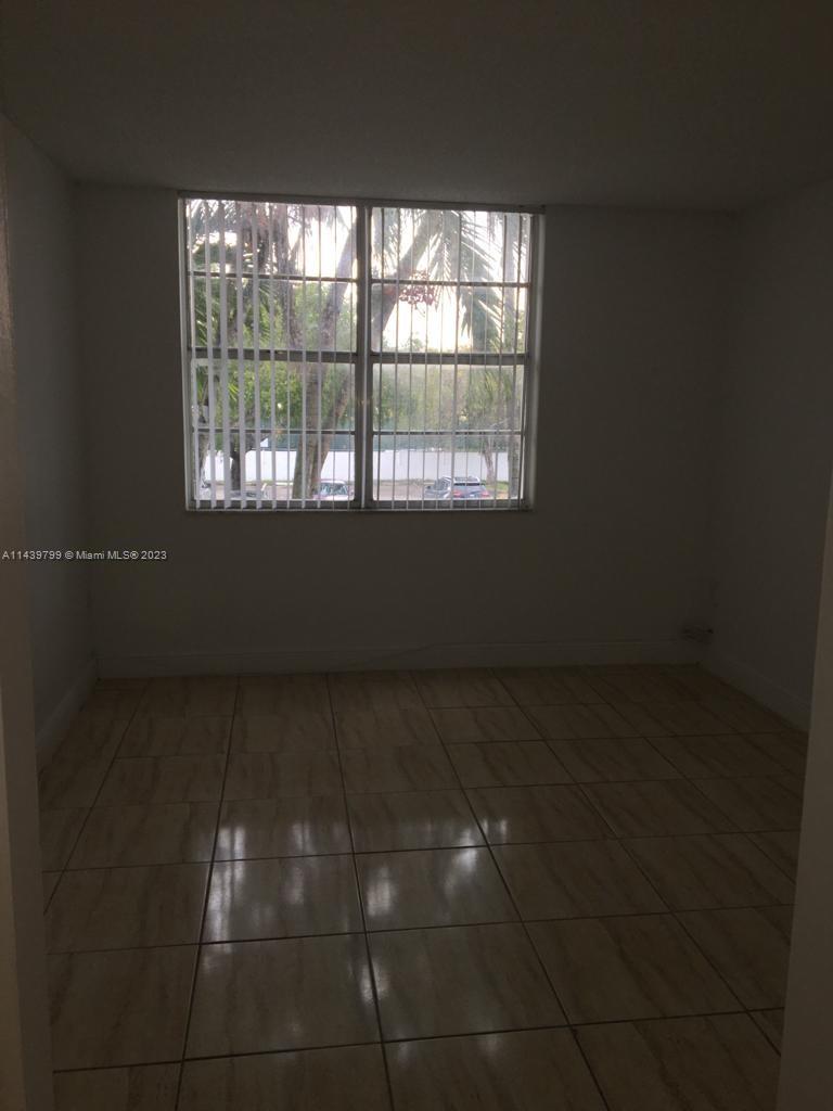 498 Northwest 165th Street, Unit D205 Miami, FL 33169 - Photo 8 of 18