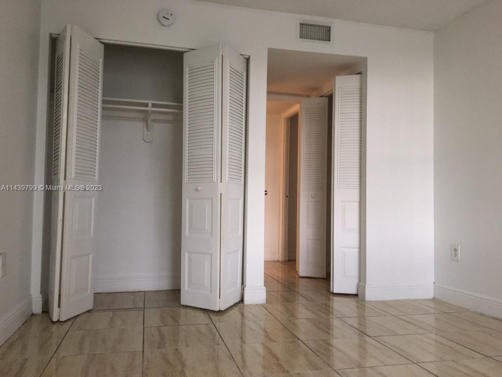 498 Northwest 165th Street, Unit D205 Miami, FL 33169 - Photo 10 of 18