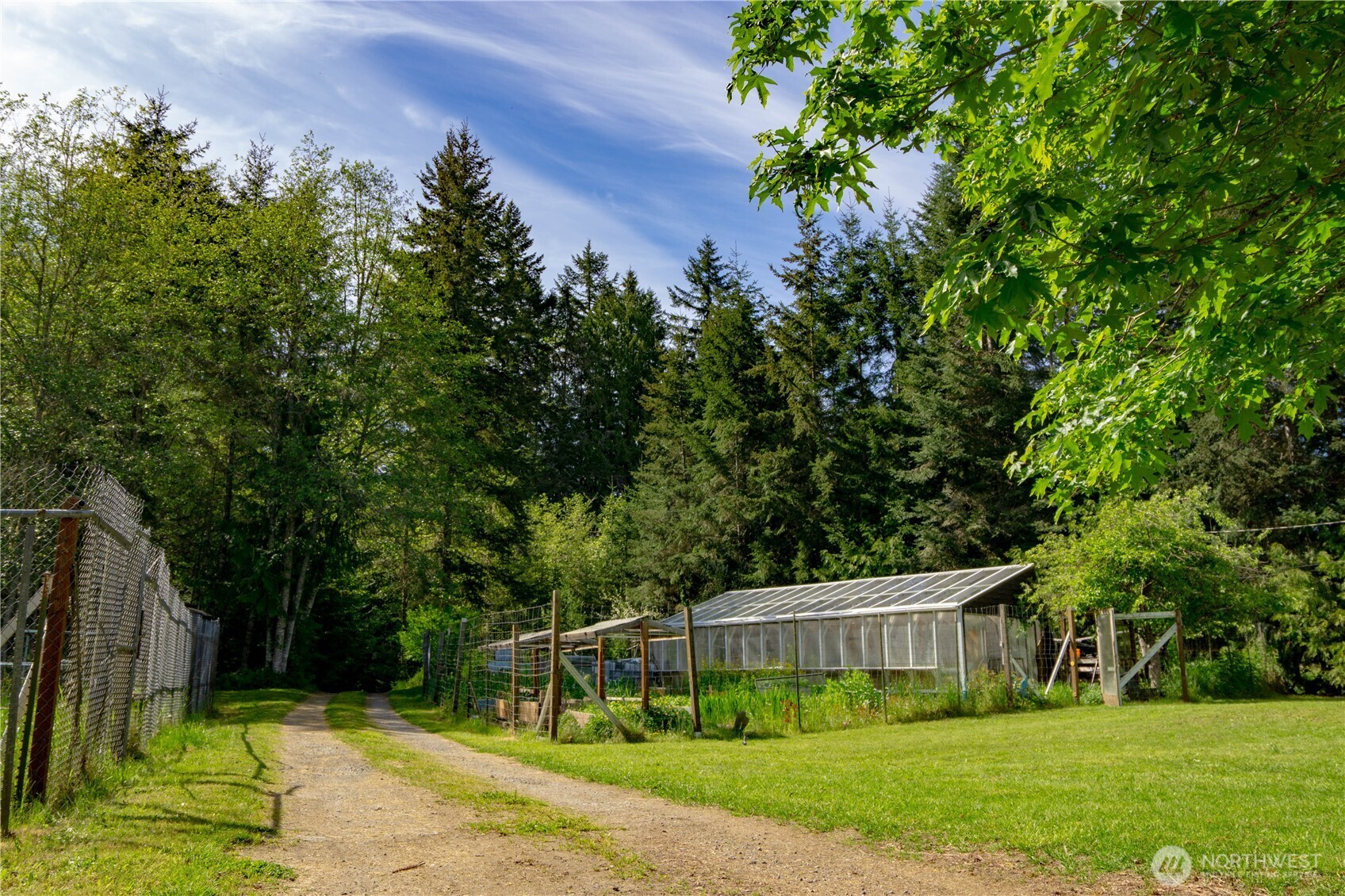 89 Slab Camp Road Sequim, WA 98382 - Photo 29 of 40 a view of a house with a park