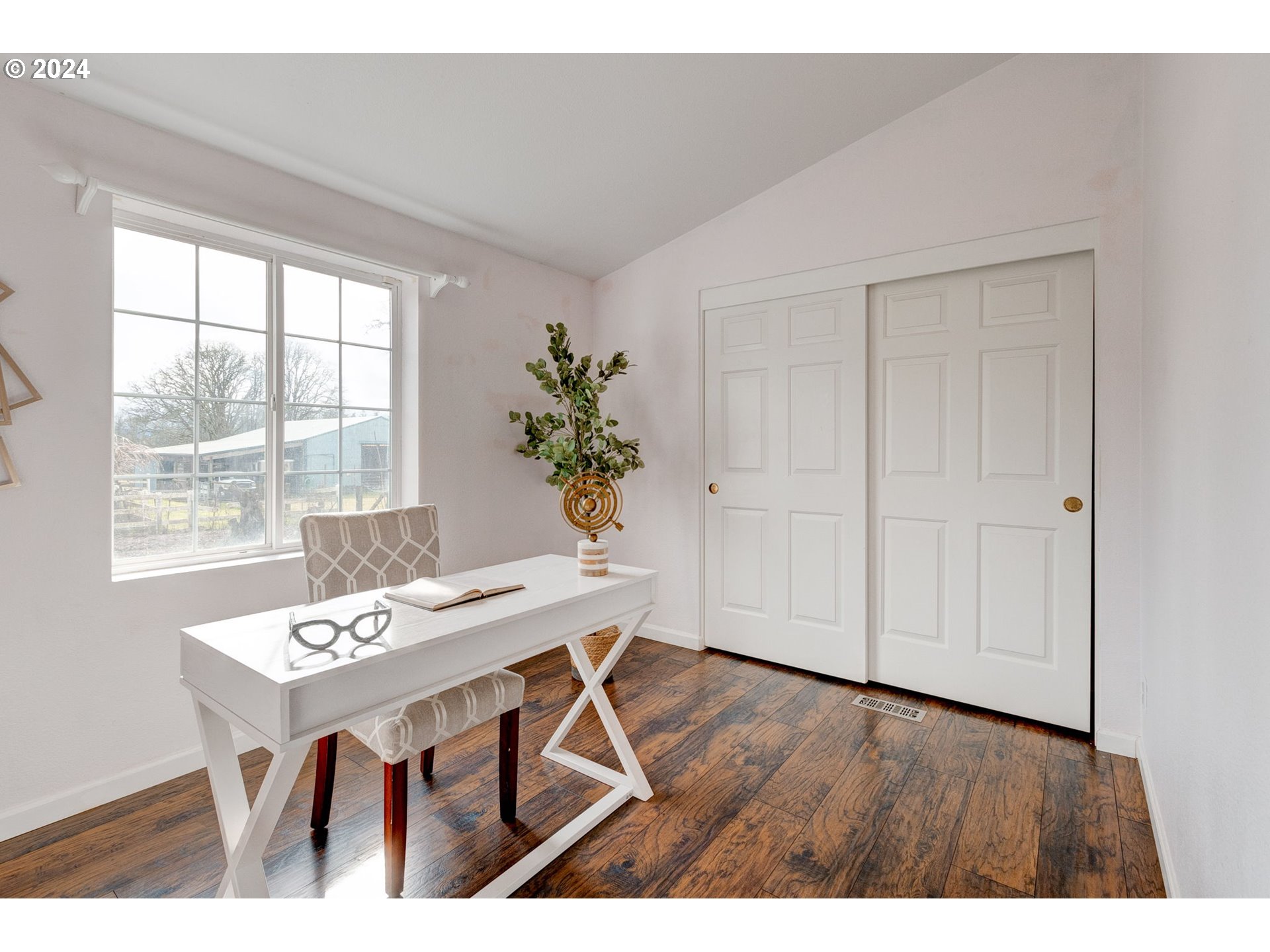 22120 Southwest Riggs Road Beaverton, OR 97078 - Photo 10 of 35 a view of a dining room with furniture window and wooden floor