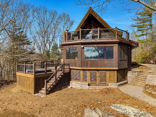 front view of a house with large windows