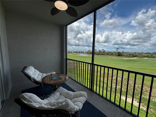 a view of a porch with furniture