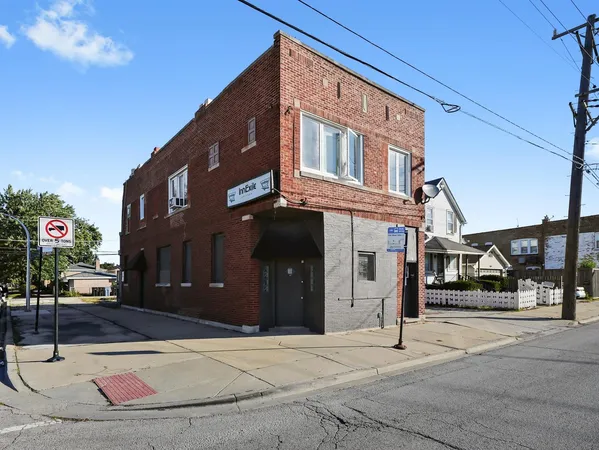 a front view of a building with street view