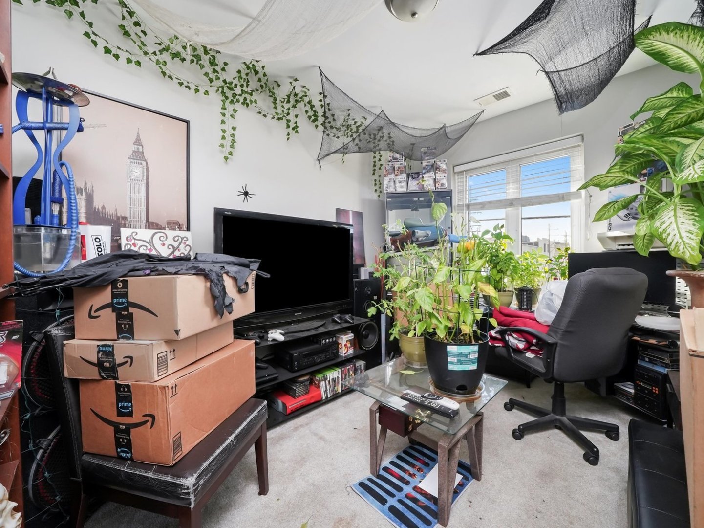 5758 West 65th Street Chicago, IL 60638 - Photo 26 of 33 a work room with furniture and a flat screen tv