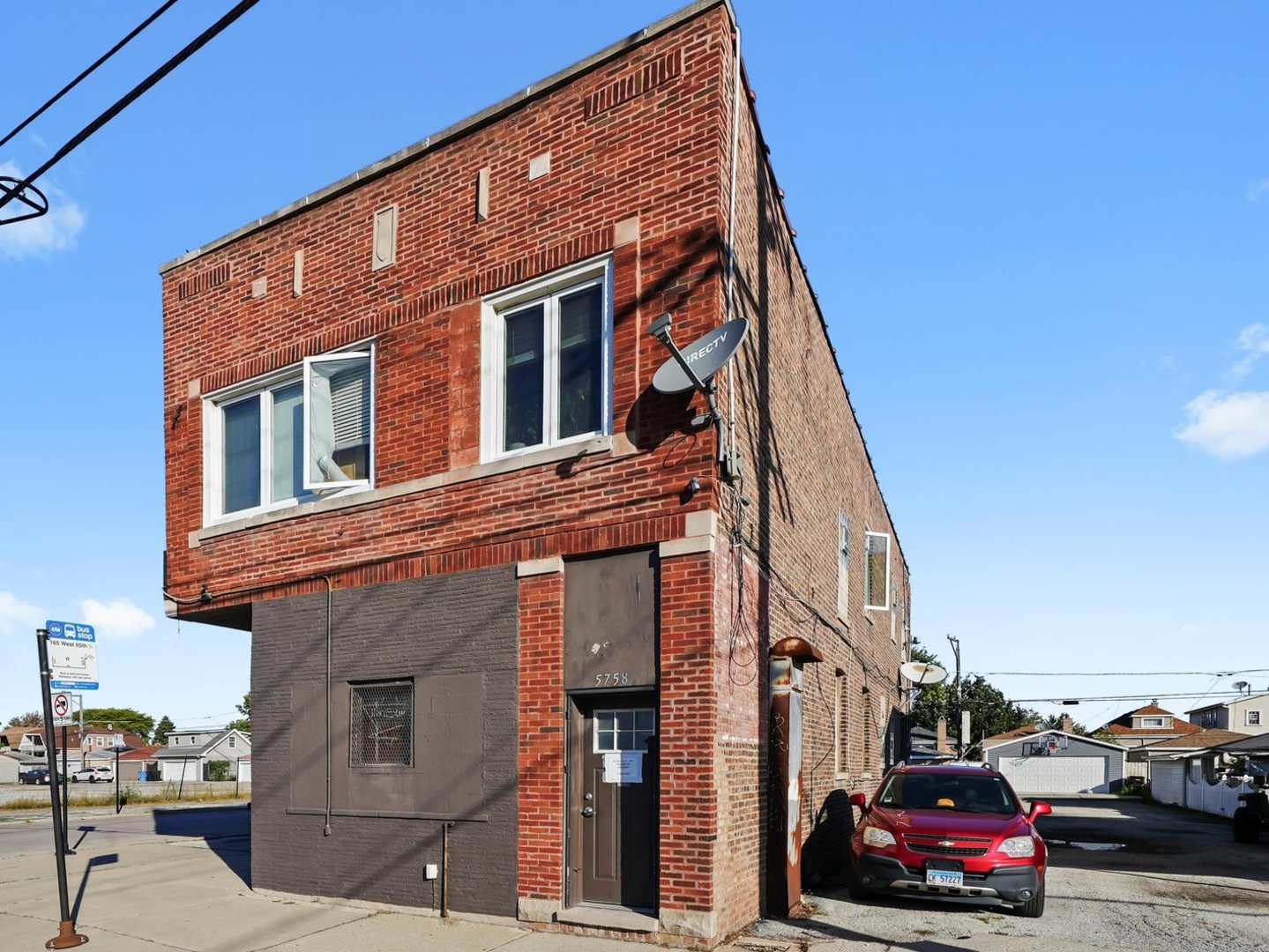 5758 West 65th Street Chicago, IL 60638 - Photo 3 of 33 a car parked in front of a building