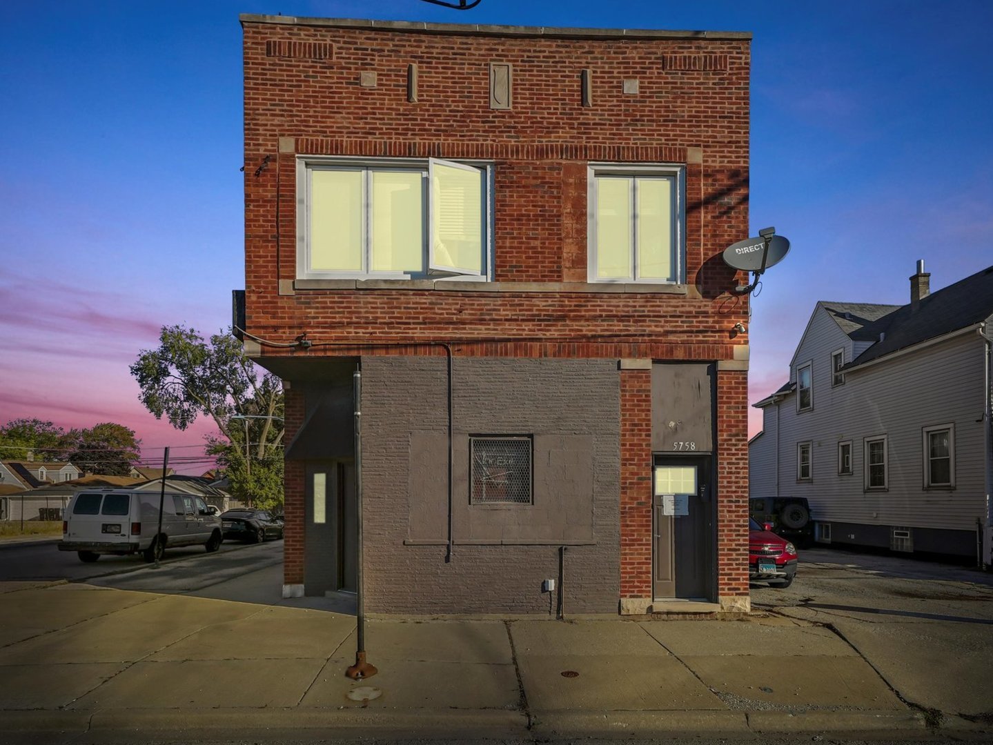 5758 West 65th Street Chicago, IL 60638 - Photo 5 of 33 a view of a house with a street