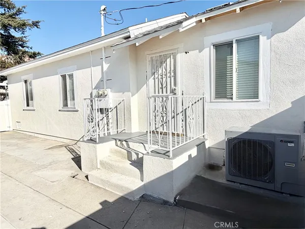 a front view of a house with patio