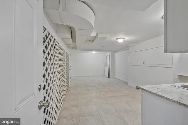a view of a utility room with garage
