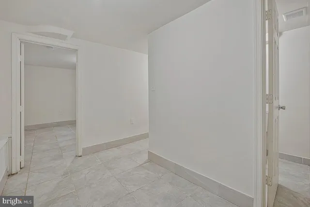 a view of a room with an empty space