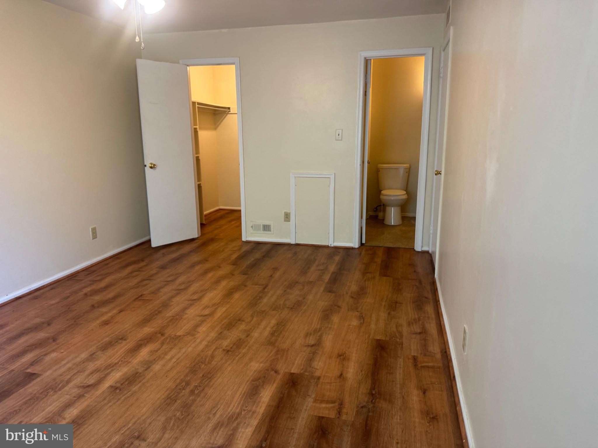 1908 B Ralston Drive Mount Laurel, NJ 08054 - Photo 12 of 21 a view of a room with wooden floor and brick wall