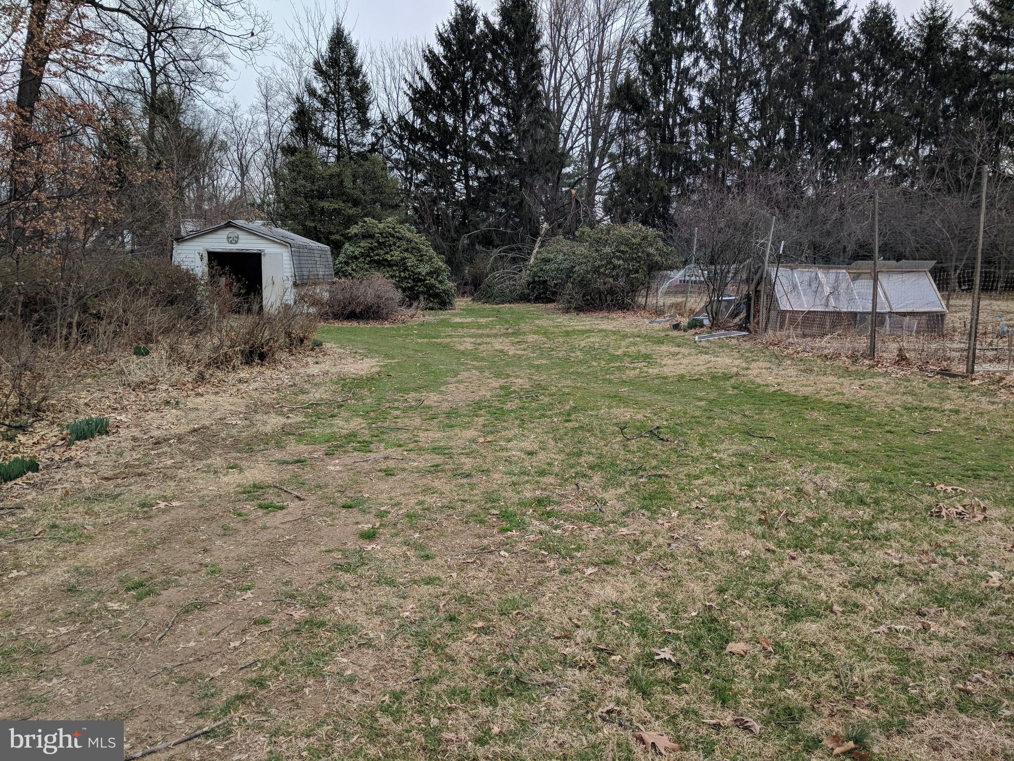 17332 Donora Road Silver Spring, MD 20905 - Photo 7 of 18 a view of a house with backyard and a garden