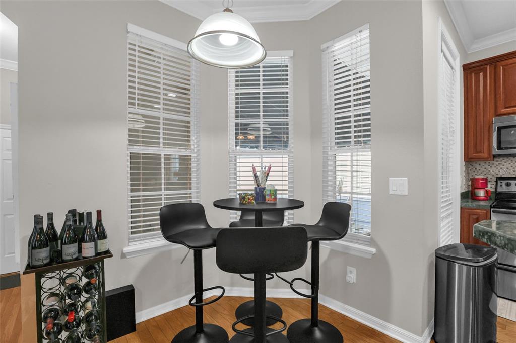 2165 Ridgewood Street Orlando, FL 32803 - Photo 10 of 37 a dining room with furniture and a window