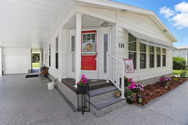 a view of a lobby with a flower garden