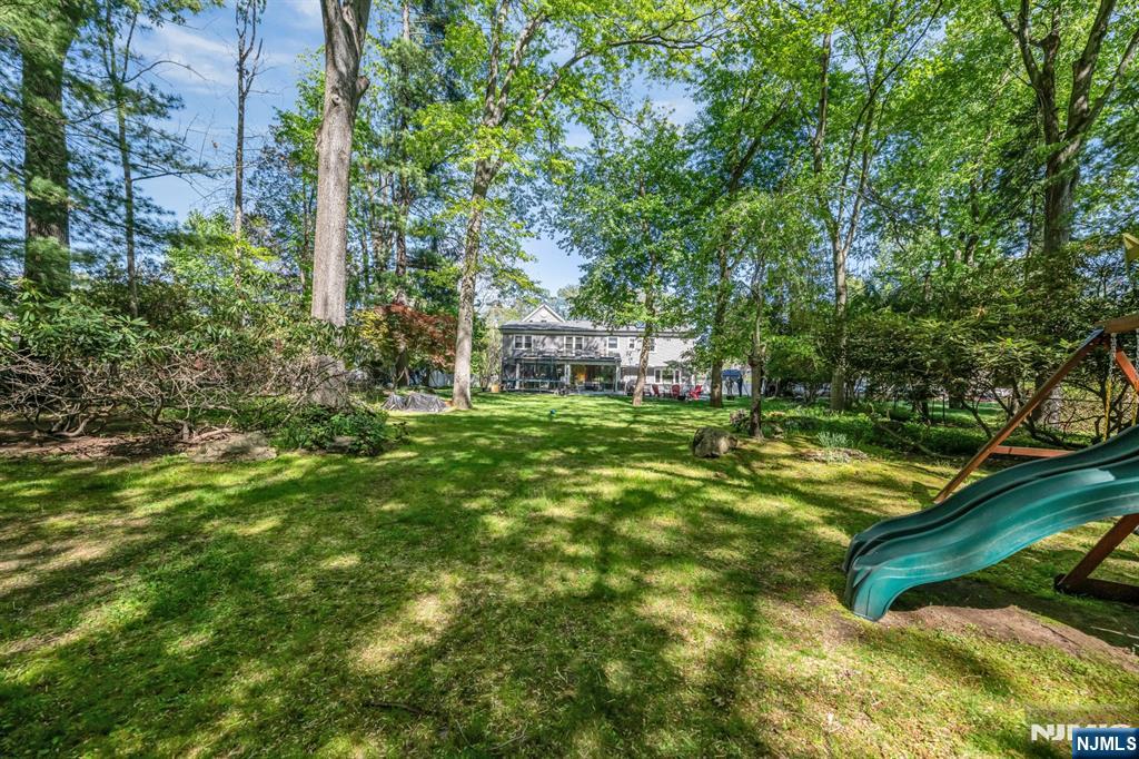 433 Piermont Road Cresskill, NJ 07626 - Photo 45 of 49 a view of a house with a small yard