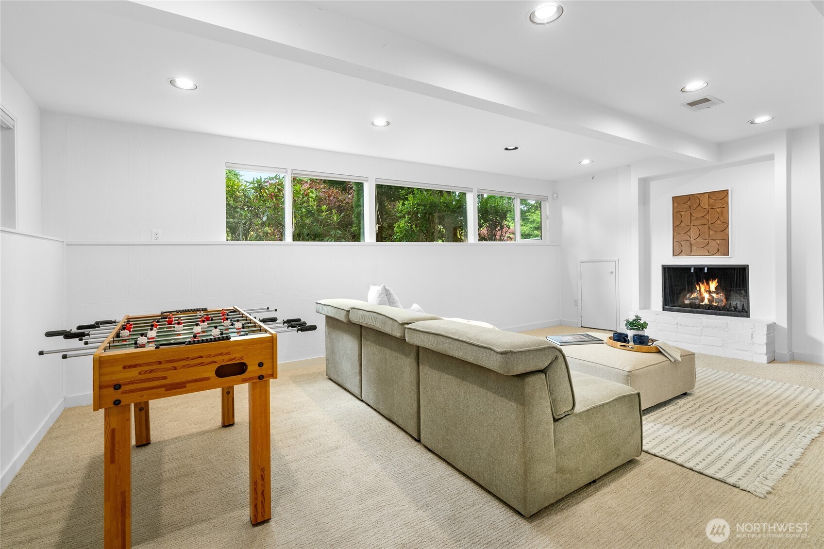 5 Wembley Lane Mercer Island, WA 98040 - Photo 21 of 40 a living room with furniture and a fireplace