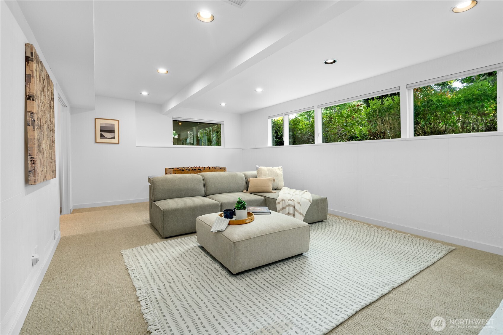 5 Wembley Lane Mercer Island, WA 98040 - Photo 22 of 40 a living room with furniture and a large window