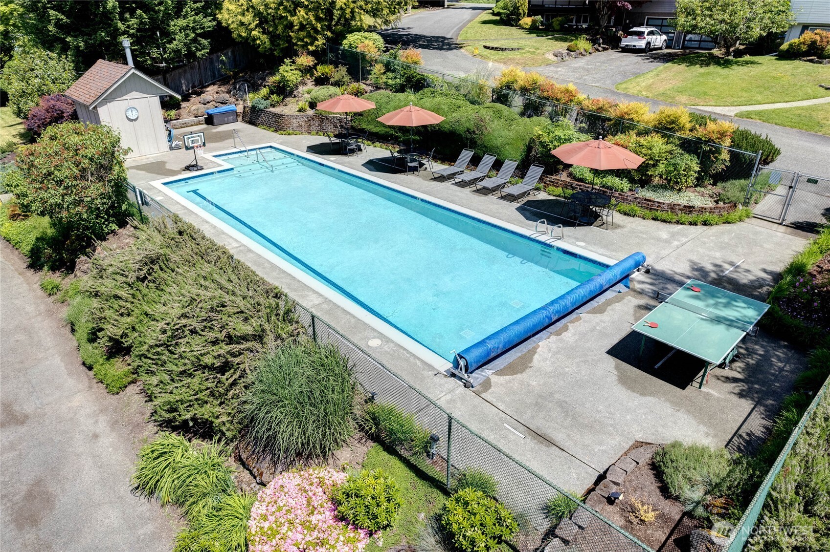 5 Wembley Lane Mercer Island, WA 98040 - Photo 37 of 40 an aerial view of a tennis ground and a cars park side of the road