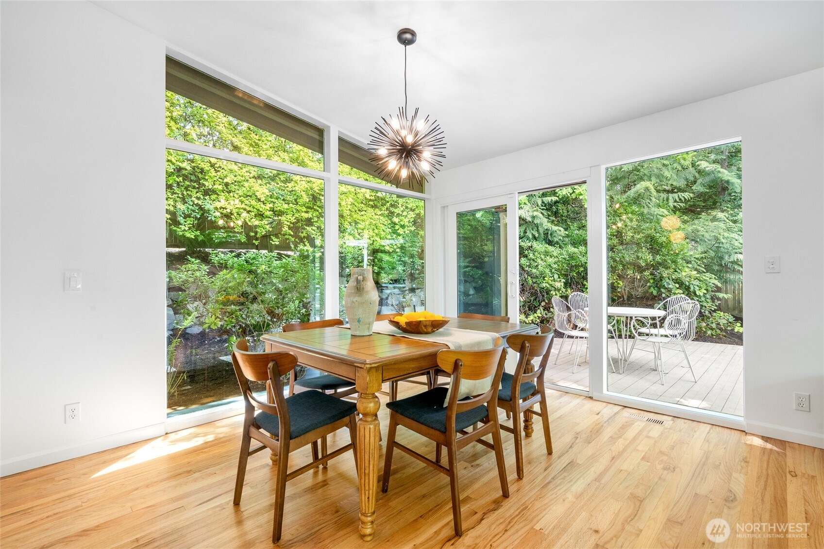 5 Wembley Lane Mercer Island, WA 98040 - Photo 5 of 40 a view of a dining room with furniture window and outside view