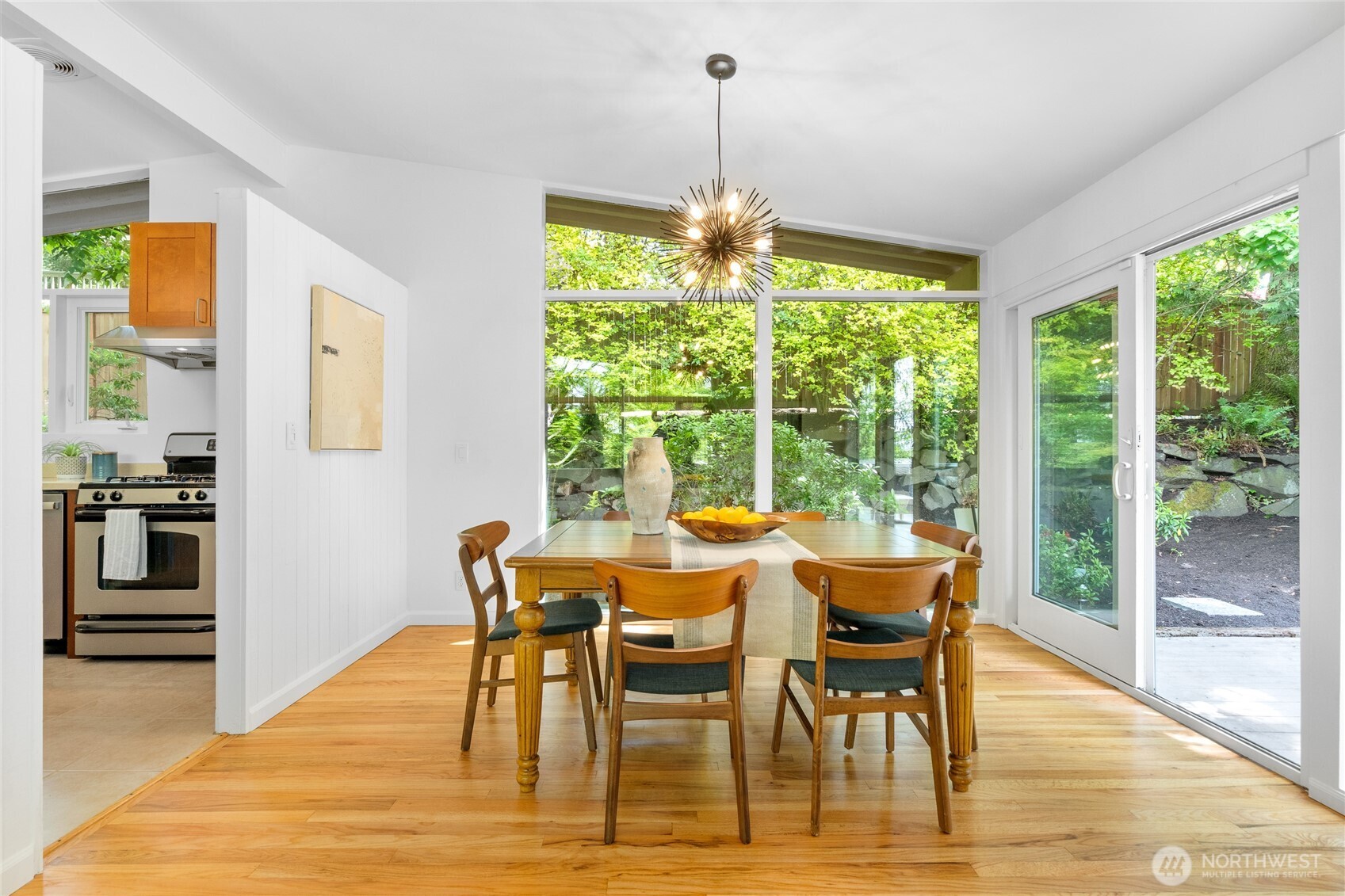 5 Wembley Lane Mercer Island, WA 98040 - Photo 6 of 40 a view of a dining room with furniture window and wooden floor