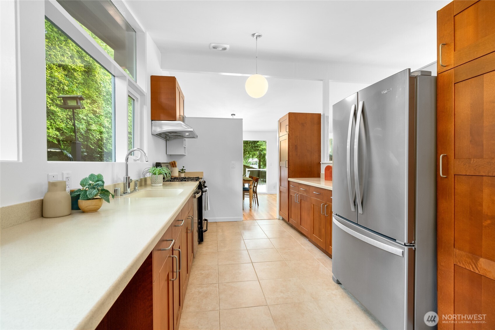 5 Wembley Lane Mercer Island, WA 98040 - Photo 9 of 40 a kitchen with stainless steel appliances granite countertop a refrigerator and a sink