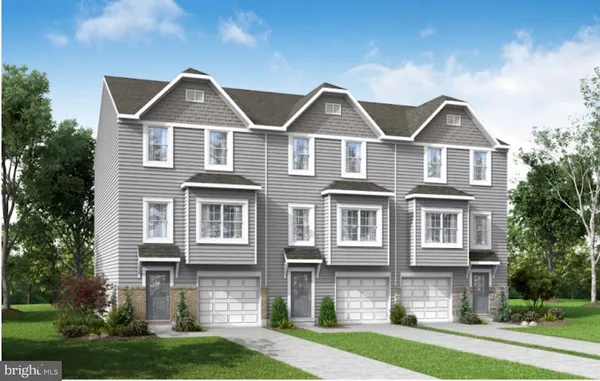 a front view of a house with yard