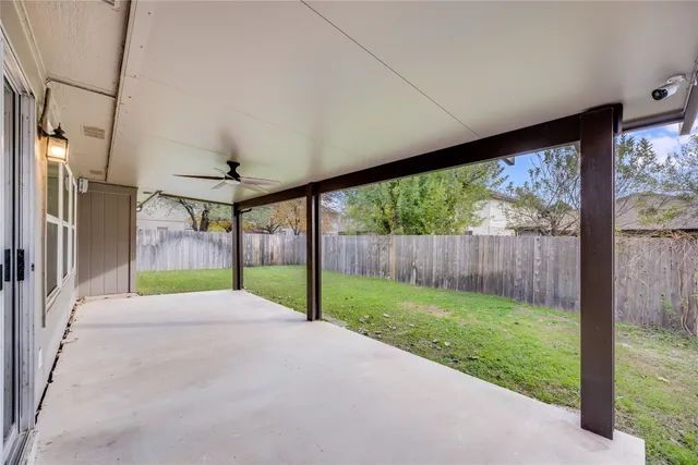 a view of a porch with porch and garden