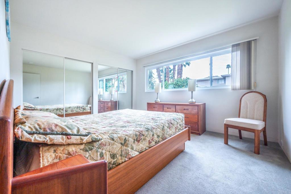 69850 Highway 111, Unit 18 Rancho Mirage, CA 92270 - Photo 19 of 41 a bedroom with a bed and window