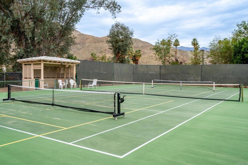 69850 Highway 111, Unit 18 Rancho Mirage, CA 92270 - Photo 30 of 41 a view of a tennis court