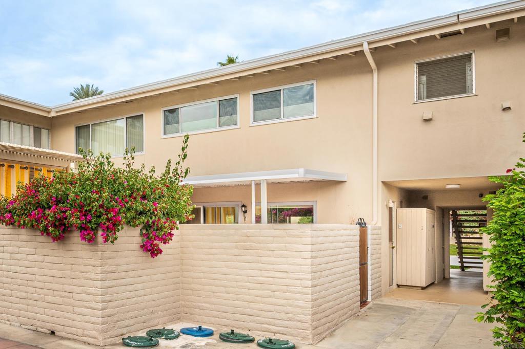 69850 Highway 111, Unit 18 Rancho Mirage, CA 92270 - Photo 39 of 41 a front view of a house with a white walls