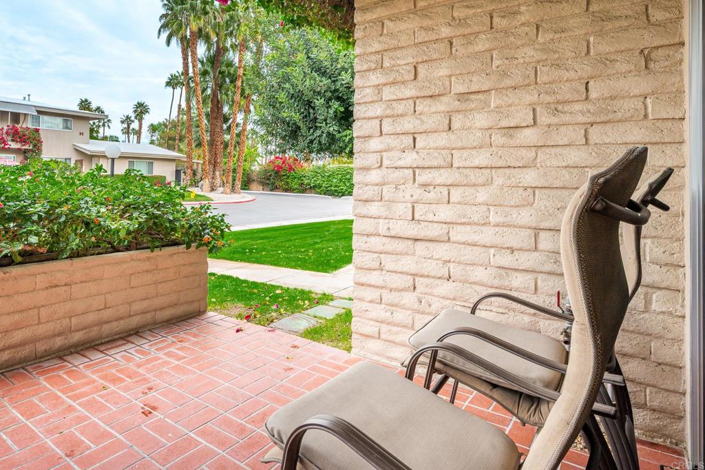69850 Highway 111, Unit 18 Rancho Mirage, CA 92270 - Photo 4 of 41 a view of a backyard with potted plants