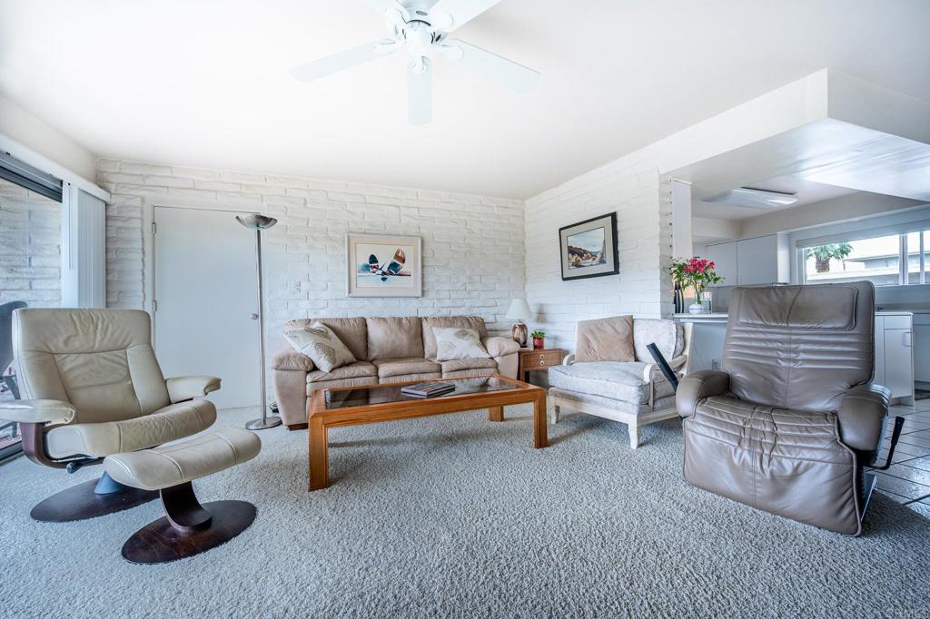 69850 Highway 111, Unit 18 Rancho Mirage, CA 92270 - Photo 9 of 41 a living room with furniture