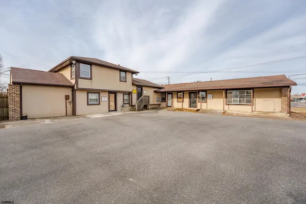a big house with large windows