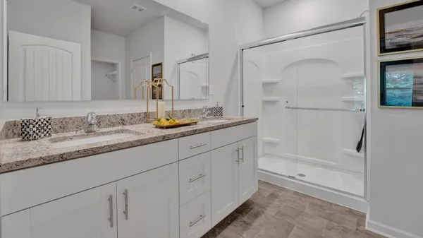 a bathroom with a granite countertop sink mirror and a