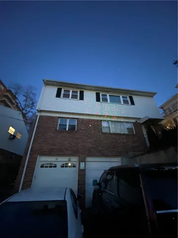 a view of a back yard of the house