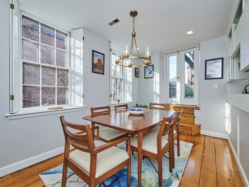 65 Pinckney Street, Unit 3 Boston, MA 02114 - Photo 4 of 14 a dining room with furniture and window