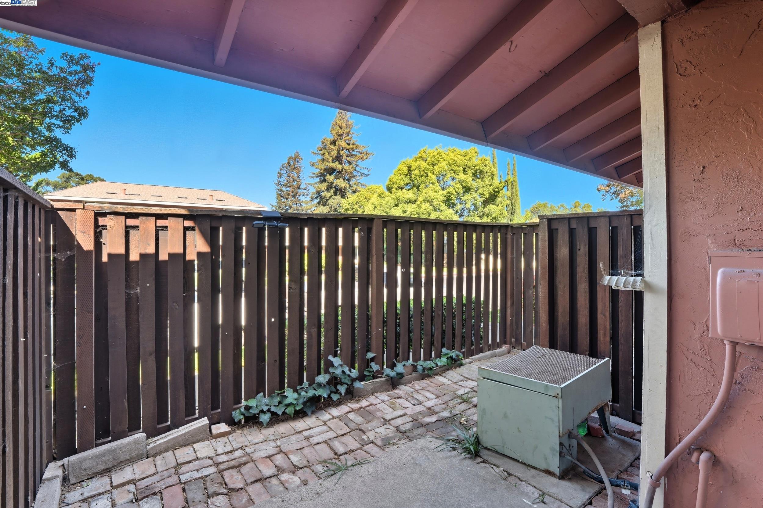 2067 Olivera Road, Unit B Concord, CA 94520 - Photo 14 of 23 a backyard of a house with wooden fence
