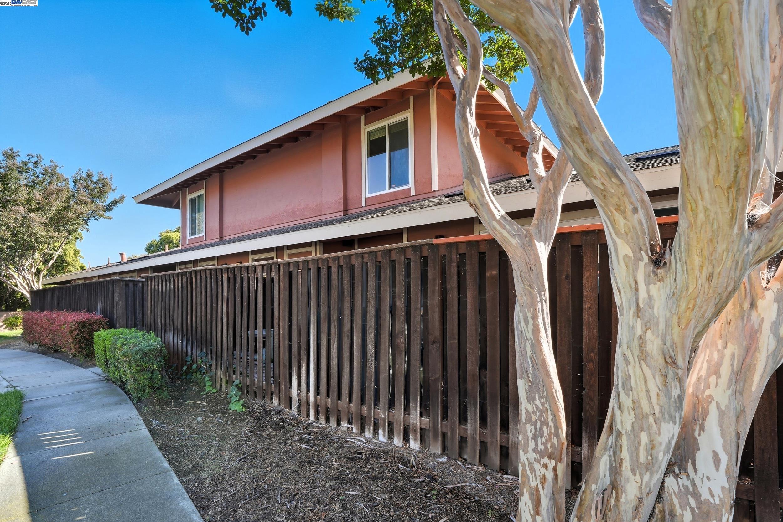 2067 Olivera Road, Unit B Concord, CA 94520 - Photo 17 of 23 a view of a house with a yard
