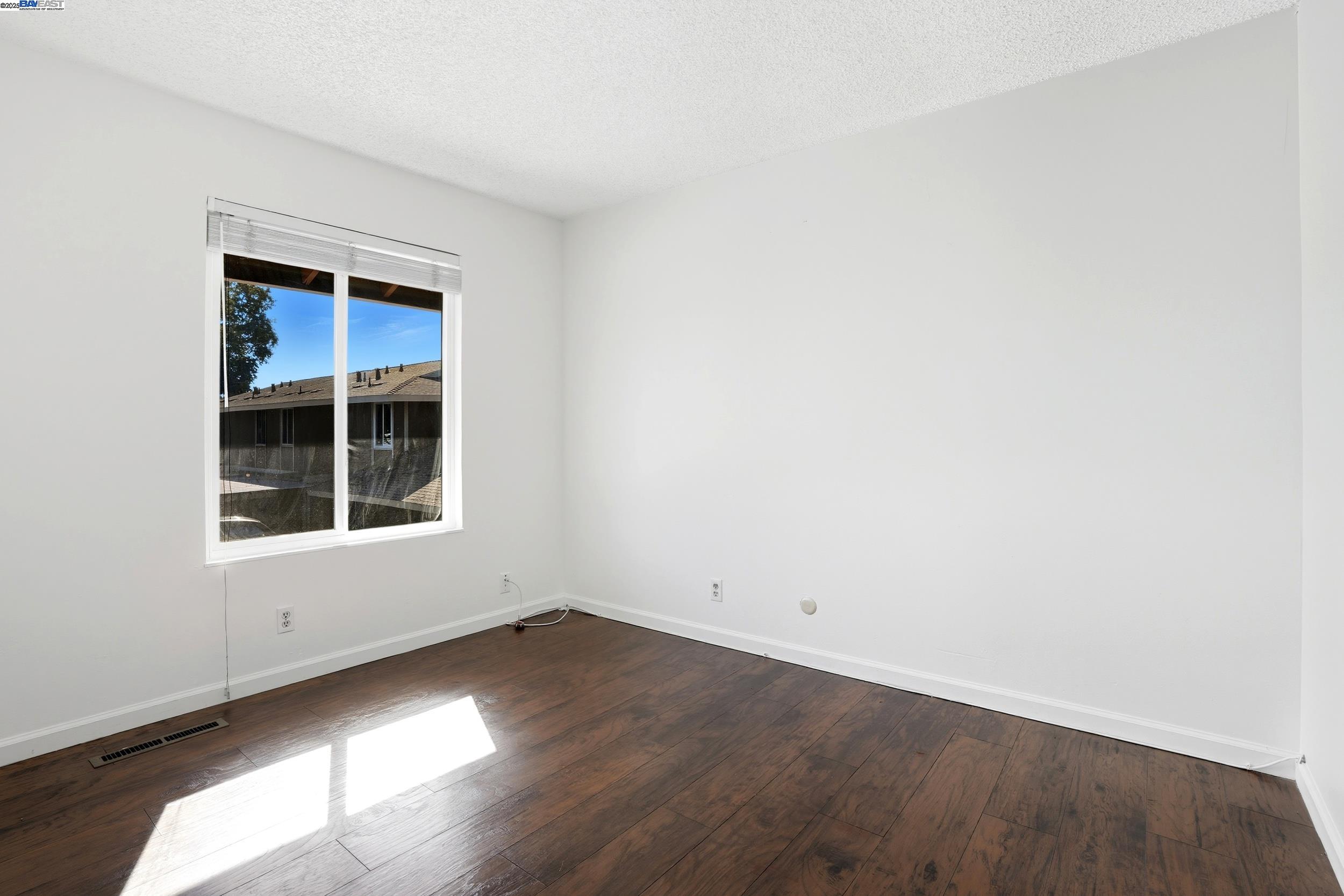 2067 Olivera Road, Unit B Concord, CA 94520 - Photo 9 of 23 an empty room with a window