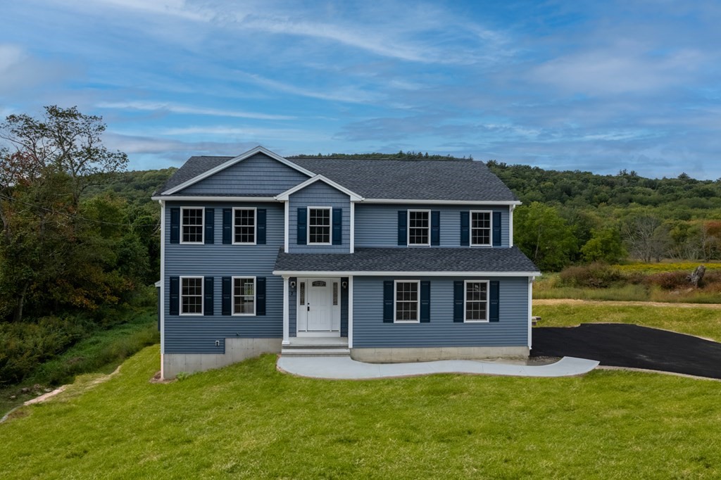 2 Upper Palmer Road Monson, MA 01057 - Photo 1 of 41 a front view of a house with a yard