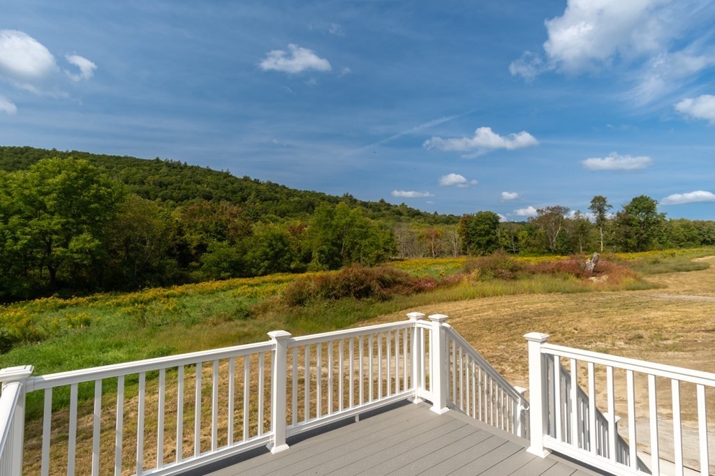 2 Upper Palmer Road Monson, MA 01057 - Photo 31 of 41 a view of a lake with a mountain