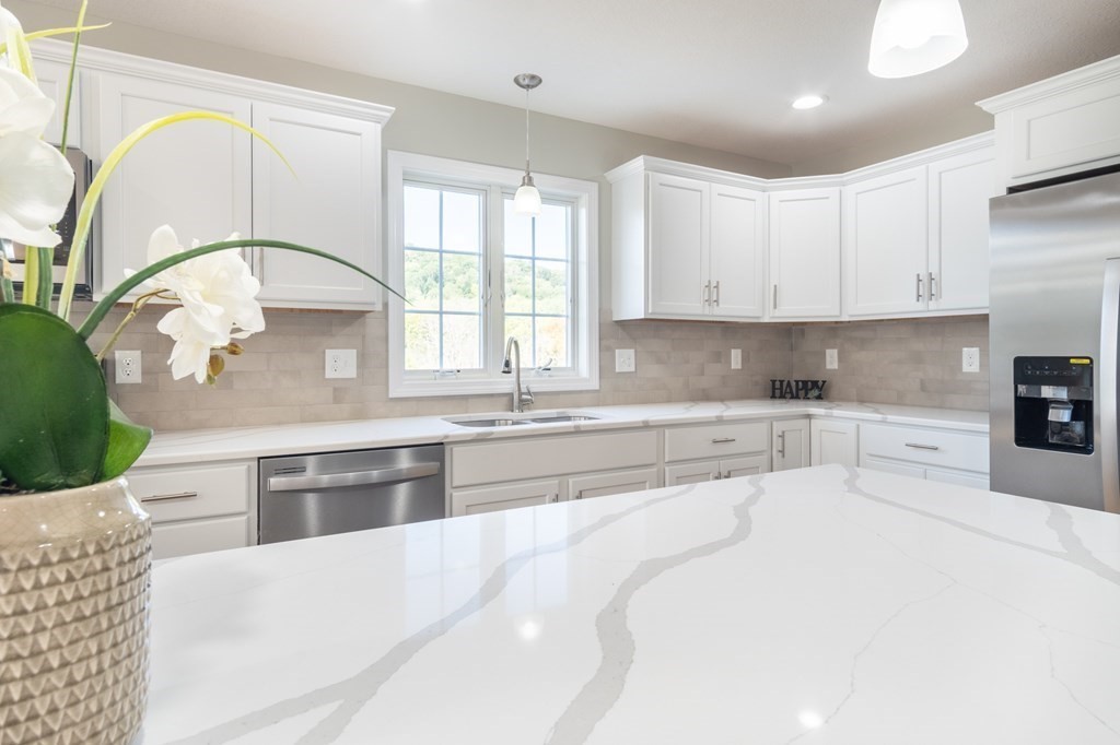 2 Upper Palmer Road Monson, MA 01057 - Photo 10 of 41 a large kitchen with granite countertop a lot of counter space and a sink