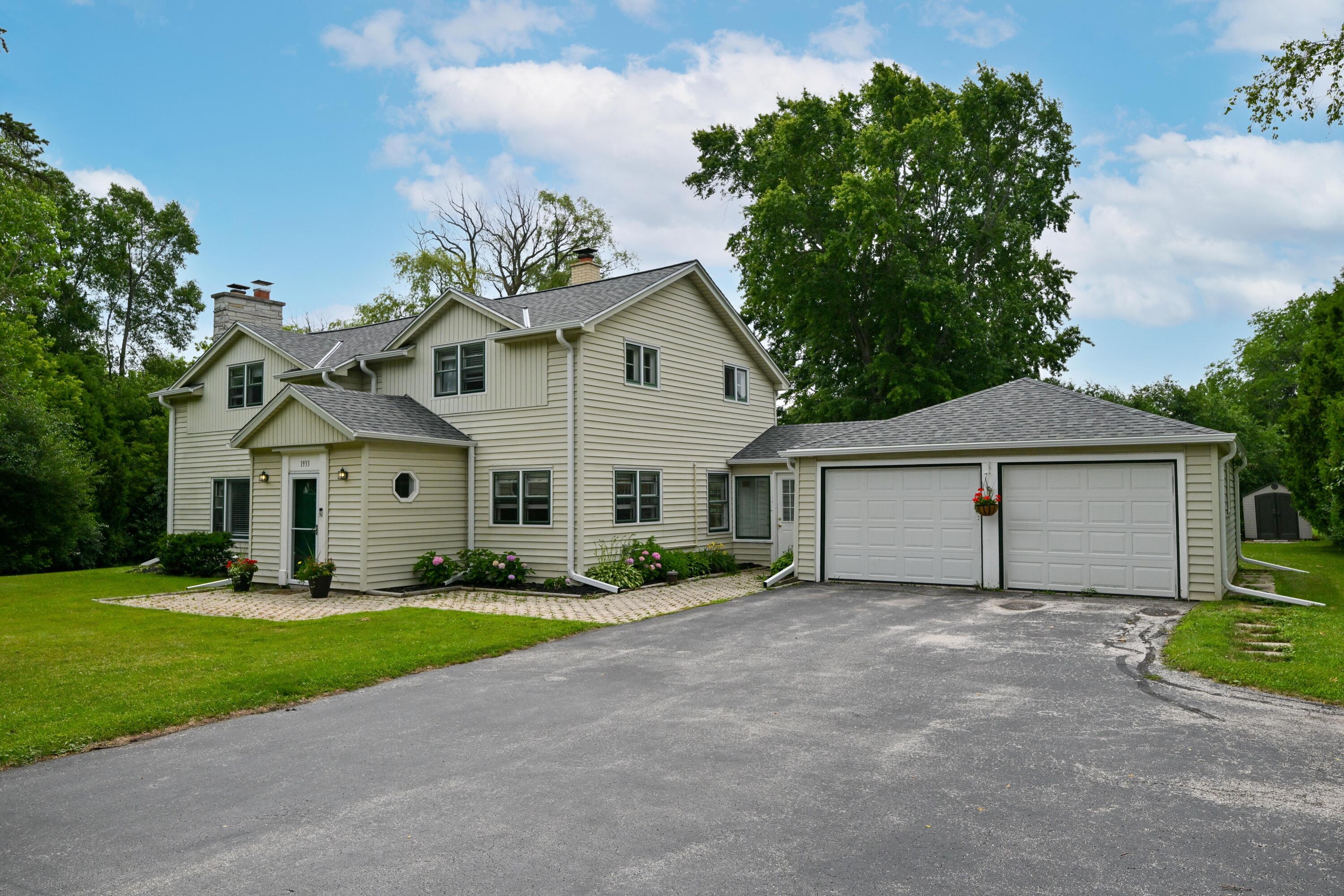 1933 West Donges Bay Road Mequon, WI 53092 - Photo 2 of 36 BRAND NEW roof and gutters, too!