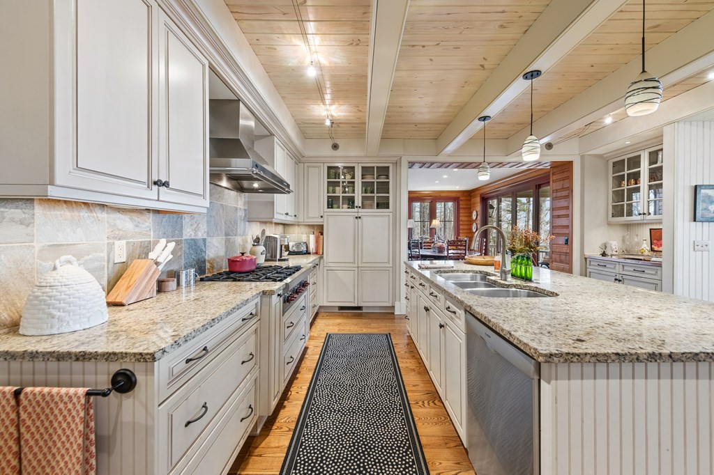 1115 Outlook Road Murphy, NC 28906 - Photo 13 of 60 a kitchen with stainless steel appliances granite countertop lots of counter top space and wooden floor