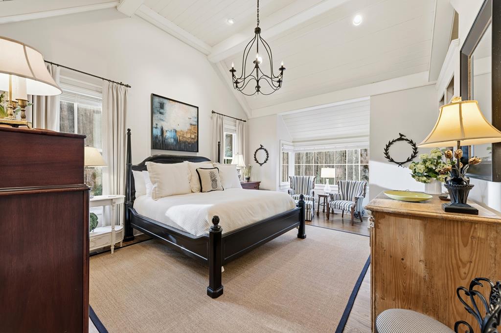 1115 Outlook Road Murphy, NC 28906 - Photo 33 of 60 a bed room with a bed window and a chair