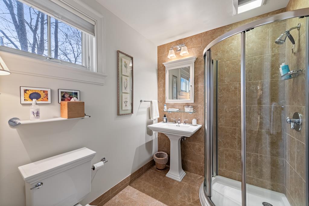 1115 Outlook Road Murphy, NC 28906 - Photo 36 of 60 a bathroom with a sink a toilet and shower