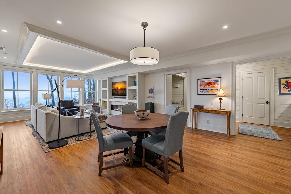 1115 Outlook Road Murphy, NC 28906 - Photo 40 of 60 a view of a dining room with furniture window and wooden floor